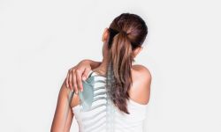 Asian woman with shoulder pain and see the bone.