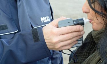 photo depicting clinical tests sobriety state driver by a policeman